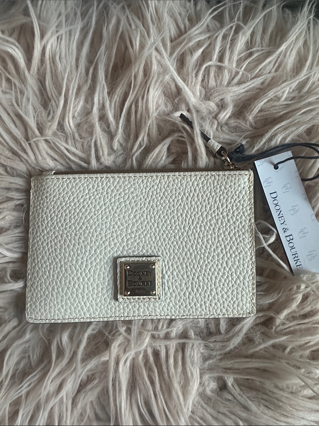 Dooney & Bourke Cream Pebble Leather Card Wristlet With Gold Plaque